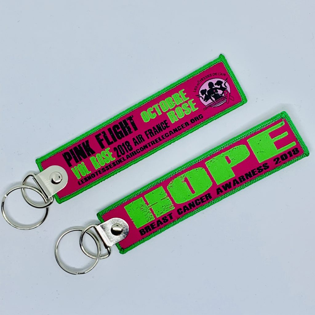 Porte clé "flamme" Vol Rose 2018