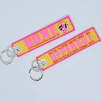 *SPORT - Porte clé "flamme" Boxe fluo paillette