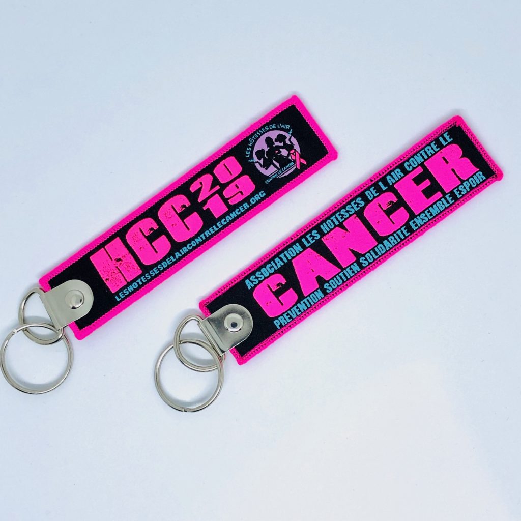 Porte clé "flamme" HCC fluo