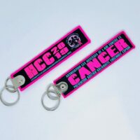 Porte clé "flamme" HCC fluo