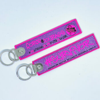 Porte clé "flamme" Survivor pailleté fluo