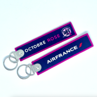 **2023/24 - Porte clé "flamme "AIR FRANCE  OCTOBRE ROSE"