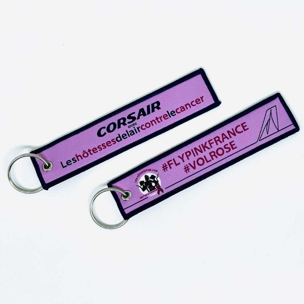 **2024 - Porte clé "flamme" "CORSAIR  OCTOBRE ROSE"