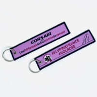 **2024 - Porte clé "flamme" "CORSAIR  OCTOBRE ROSE"