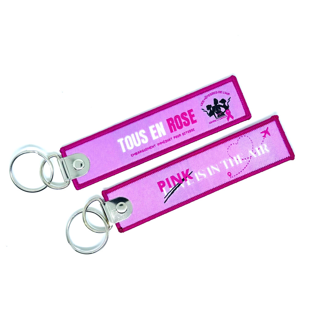 **2024 - Porte clé "flamme TOUS EN ROSE"