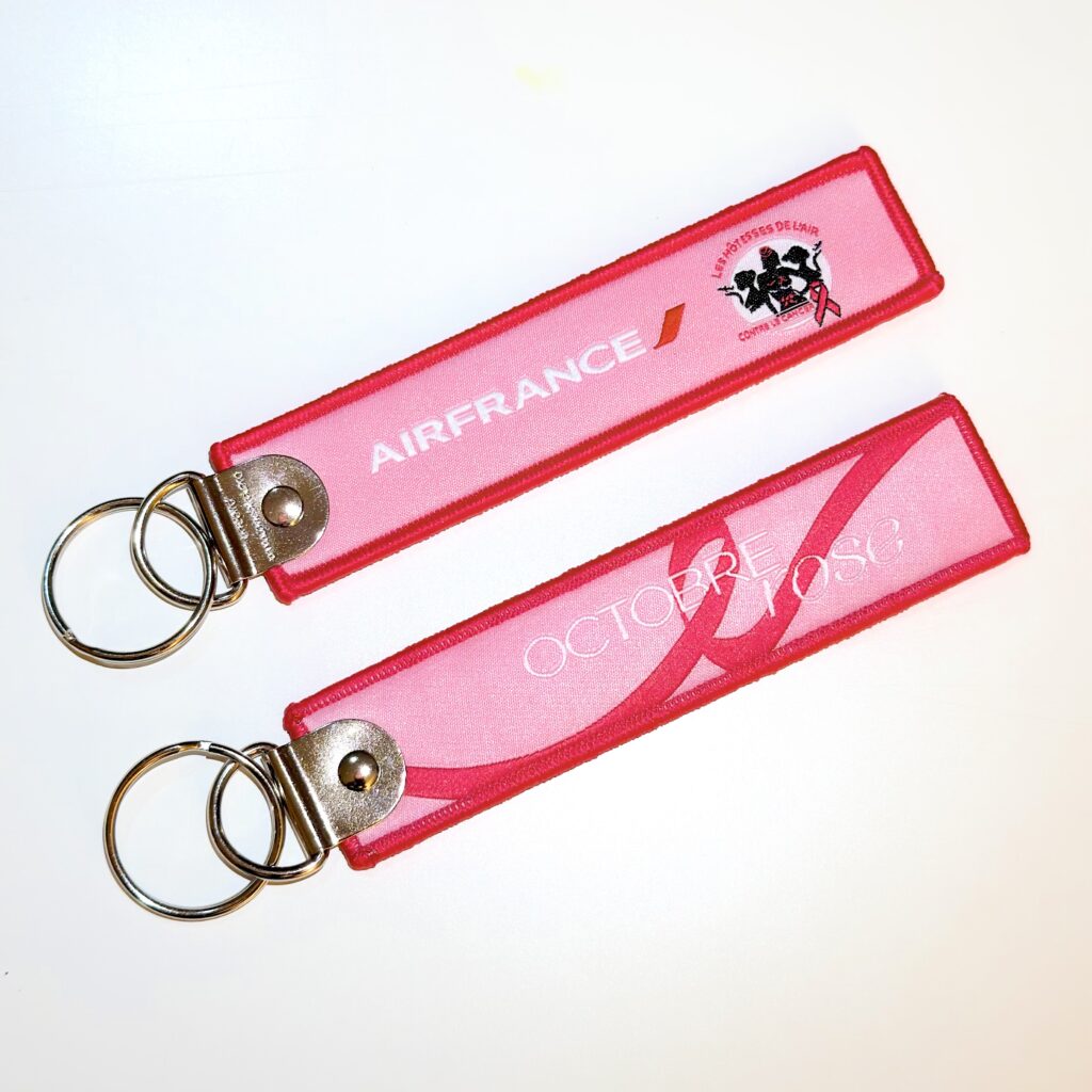 **2026** Porte clé "flamme AIR FRANCE  OCTOBRE ROSE 2026"